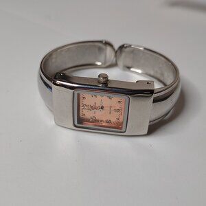 Silver Tone And Orange GK Collection 6 Inch Metal Cuff Watch